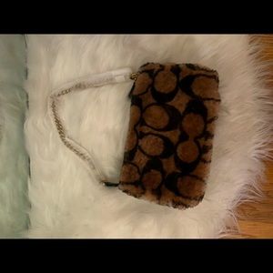 Coach x Jennifer Lopez Cheetah Nolita Bag